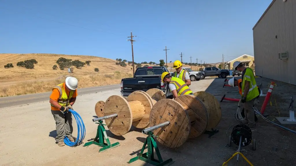 Electricians pulling wire
